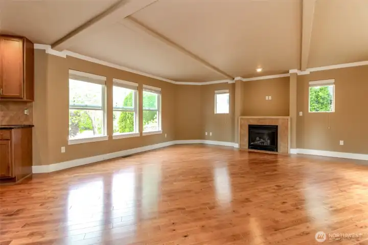 Gas fireplace serves as a beautiful focal point for the main living area.