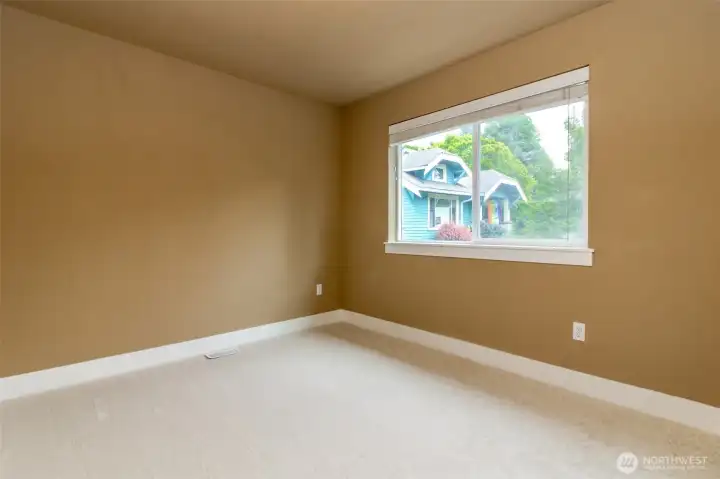 bedroom offering abundant natural light and flexible use options to fit your lifestyle.