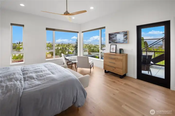 Luxurious primary suite complete with spa-inspired bath, walk-in closet, and convenient laundry access.