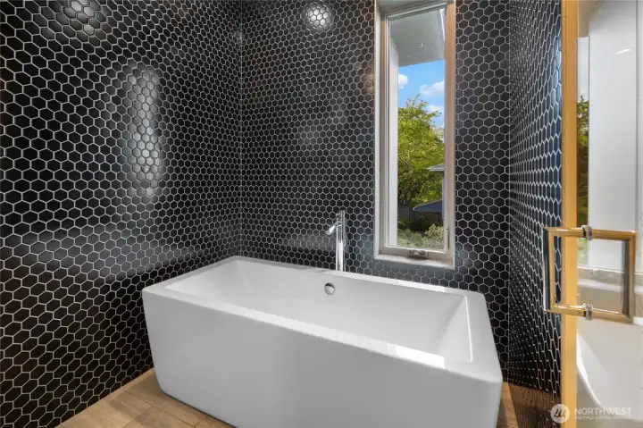 Luxe spa inspired bath with walk-in shower & soaking tub.