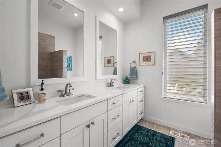 Full bathroom servicing 3 bedrooms on upper floor.