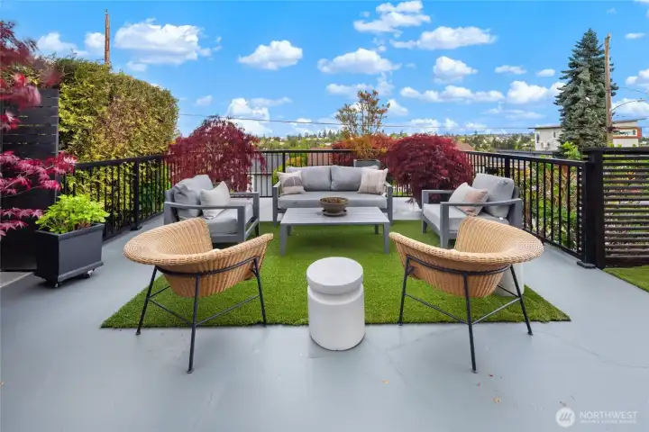 Beautiful patio off the main floor where you can enjoy morning coffee w/ views of City, Sound, Mt. Rainier.
