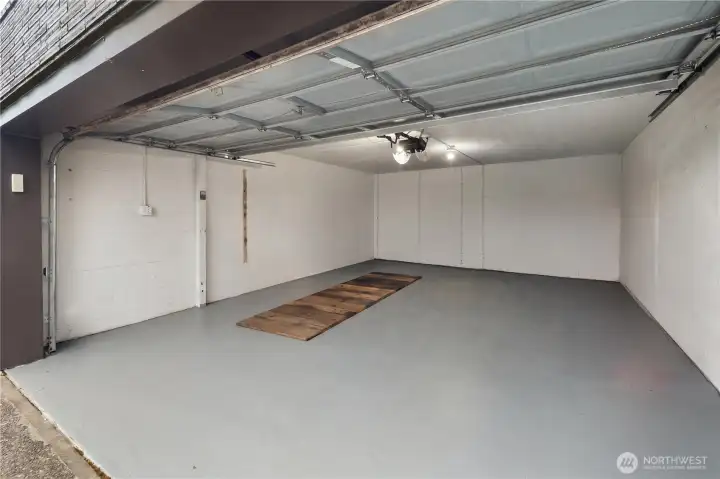 Over-sized two car garage w/ mechanic's pit.