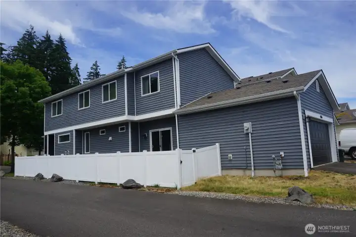 Side view of home to include the newer roof