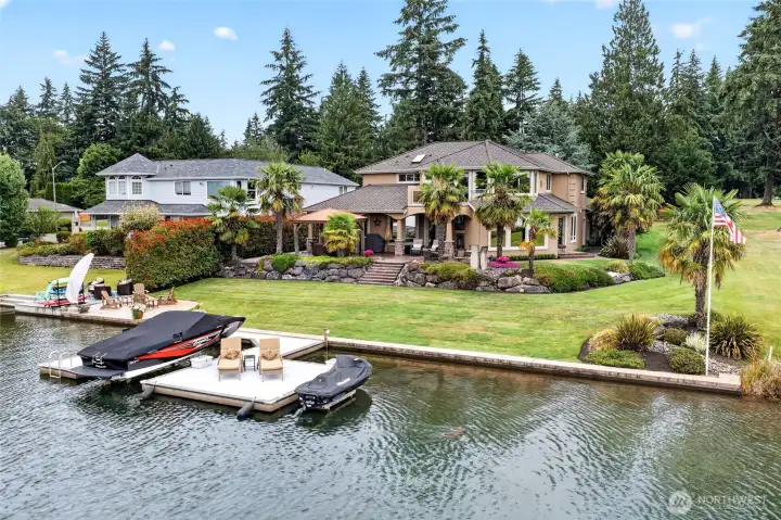 Welcome to this spectacular Tapps Island waterfront and golf course home with Mt Rainier views