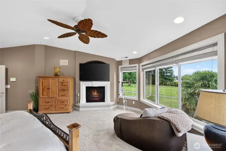Cozy gas fireplace in the primary suite