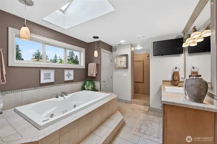 Enjoy the spa like bath with soaking tub, dual vanities and separate shower