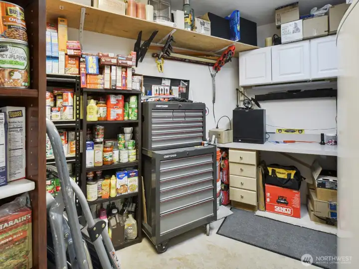 This space is being used as a workshop and a pantry/storage area! It’s got power and everything you need to fully take advantage of this extra room. Like the ‘outdoor living space’ they’ve created, it is in addition to the square footage indicated for the home! You’re going to love it!