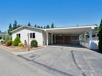 This turn-key home offers so much; carport parking for two vehicles, more in the driveway and on the street, RV or boat parking in a private lot you'll have access to, and an amazing 'indoor living space' you'll see upon opening the folding doors at the end of the carport. You don't want to miss checking this out!