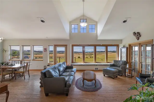 Living room with picture windows highlighting the incredible views.