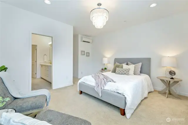 Luxurious & spacious primary suite w/ elegant bath & huge walk-in closet.