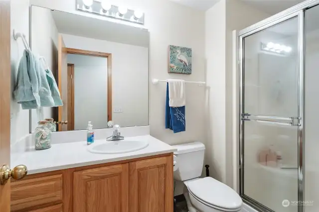 Smaller 3/4 bath near entry.