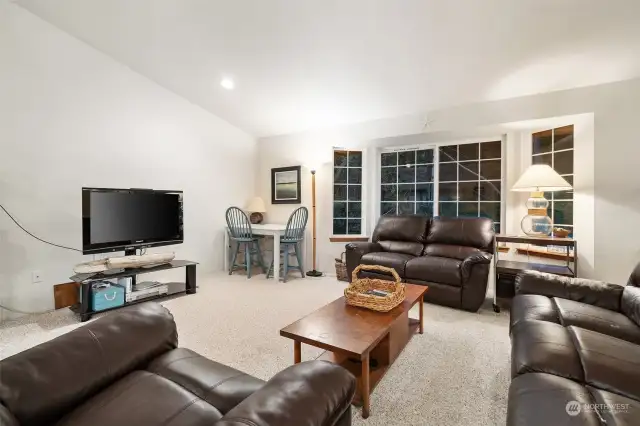 Living room with bay window.  Photos were taken after dark!