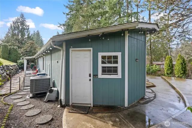 Shed in back of home for more storage area.