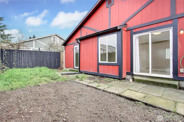 Fenced Yard Direct access to Kitchen & Primary Room