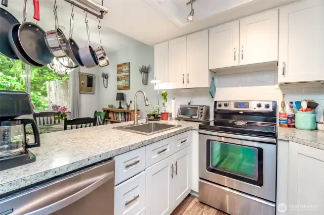 Modern kitchen with newer stainless appliances and great counter space