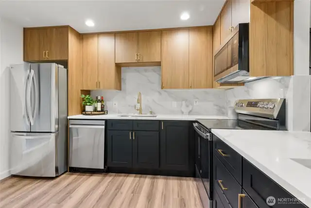 brand new stainless steel appliances and new cabinets