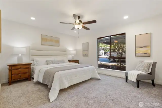 Enjoy this primary bedroom with lots of natural light
