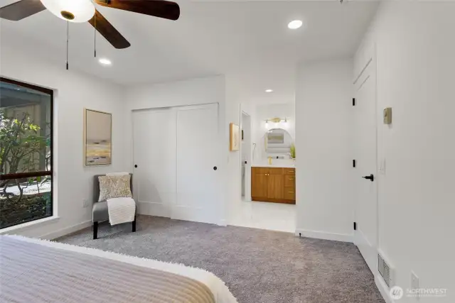 Two closets and attached primary bath