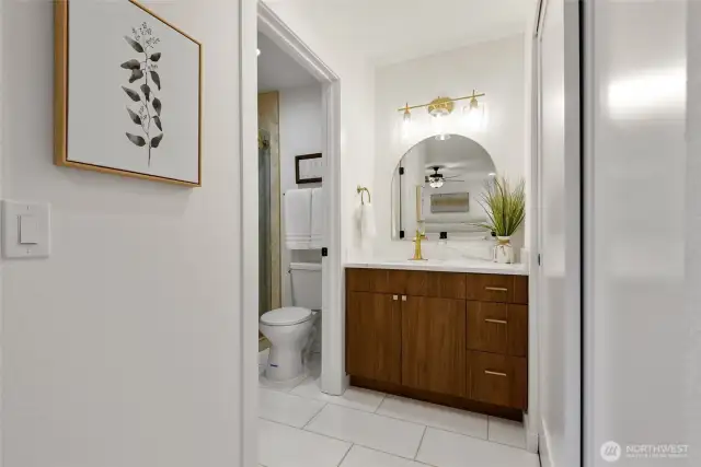 updated primary bath, new tile floors, sink and cabinets