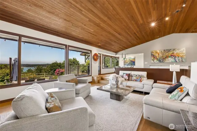 The living area is 2 steps down from the entry, showcasing glorious   views of the Olympics and Puget Sound.