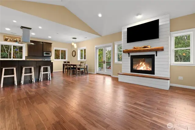 Upper level Great room concept with living, dining, kitchen combo Gas fireplace