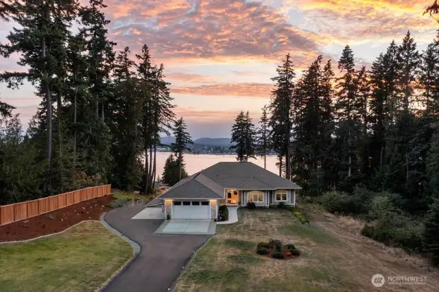 No expense spared! After years of building homes, the owner's designed the perfect home and put every upgrade possible within! This 2.74 Acre lot offers majestic views of the Olympic Mtns, entertaining view of boats coming and going from the Port Orchard Marina, and Ferries crossing the Puget Sound.  Boasting 4,975 Square feet split between the main floor and the lower level.  The exterior has stacked stone accents and cement board siding with exterior lighting along the sidewalk and driveway. The roof is a 50 year "presidential" composition material, the insulated garage is extra deep and might even fit 4 cars! Each floor is independently heated-- Two heat pumps provide efficient temperatures and air conditioning and each level has it's own tankless hot water system.  The whole house water purifying system is healthy for you and keeps the water system clean too. There is insulation between floors which allows for temperature control as well as sound insulation