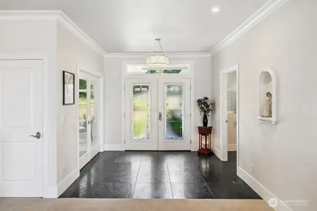 off this entry is a double french door leading to the Den/Office... because it does have a closet...this could be a 3rd bedroom if needed.  This home is on Sewer so there are not any land useage constraints that septic systems can contain. There is also a powder bath for guests.