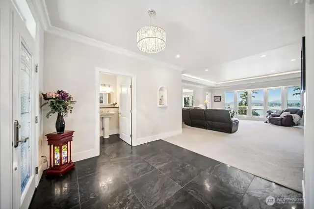 This elegant entry sets the expectations and from here you can see all the way thru the great room and beyond!