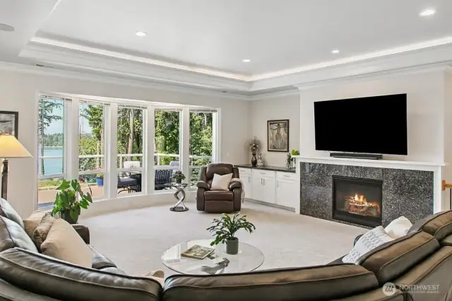 This great room is open to the Kitchen and Dining Room .