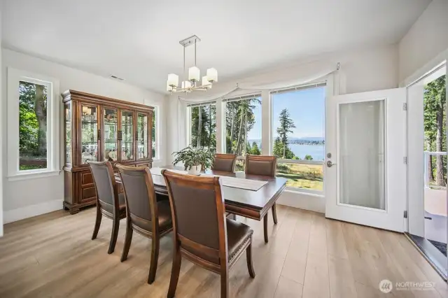 This dining room offers a place for a big table and a view .