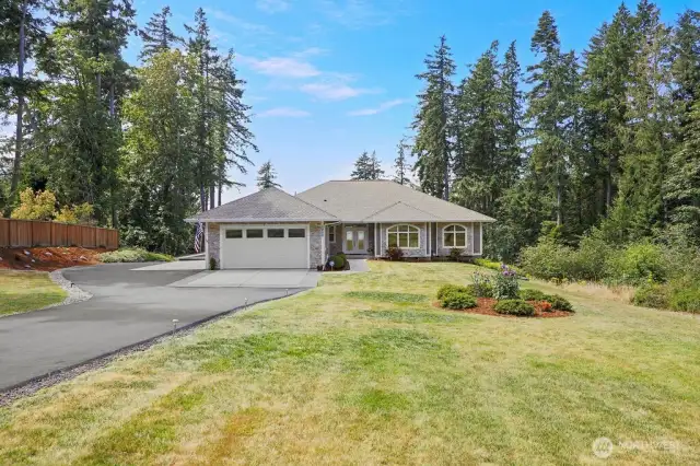 A private easement leads to this one house.... Privacy, Quiet and 2.74 Acres.  This large parcel of land is served by public water and sewer!  Plenty of room for a future swimming pool? Volleyball court? Even room to have a few hens and collect your own fresh eggs and grow a big garden. The garage has Hot & Cold Water for Washing cars.