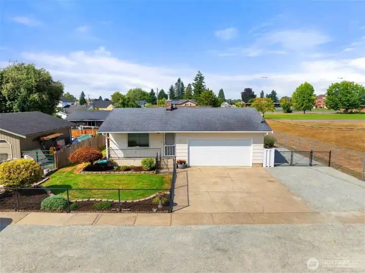 Plenty of parking with 2 car garage and fresh gravel.