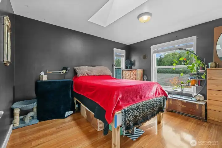 Primary Bedroom features a skylight for added natural light