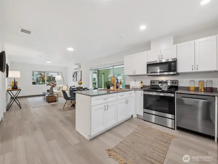 This again is the model home not the actual unit but the same floor plan . Angle from the kitchen