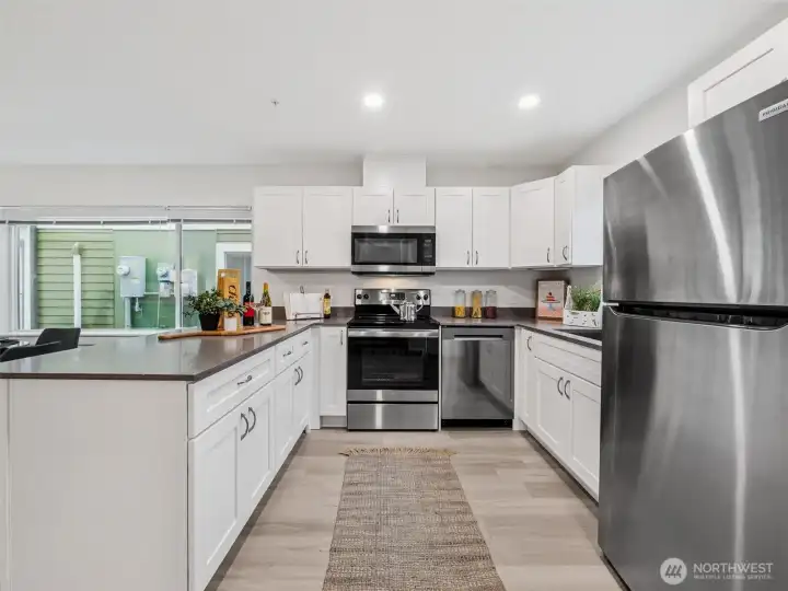 Model unit 13847- LVP flooring, stainless steel appliances, nice and bright