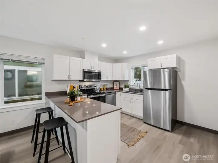 Model unit across the way- Quartz countertops,