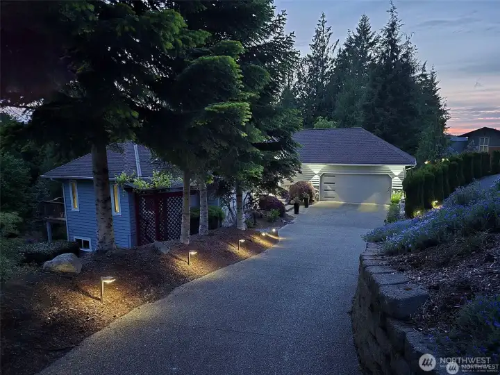 63 Red Cedar has been thoughtfully enhanced both inside and out, with every detail upgraded, refreshed, and refined. While not shown in this photo, the property also features a circular driveway—offering ease of access and ample guest parking for entertaining.