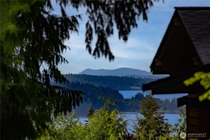 Enjoy a pretty peek-a-boo view of Port Ludlow Bay and the Cascade mountains from the deck.