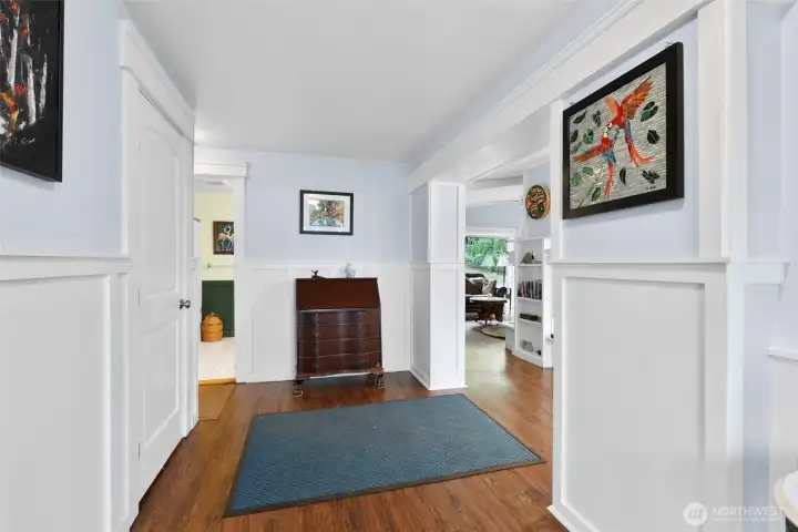 Entry looking ahead with the living/dining room to the right and guest bath to the left. Excellent layout in this home.