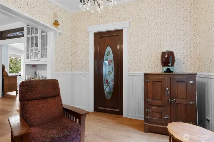 Inside the parlor looking at the pocket door that leads to the living area. This roof is a perfect place to enjoy guests while dinner is cooking ot after the meal.