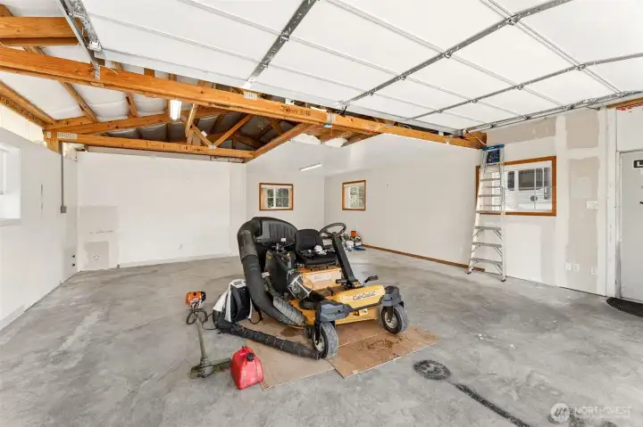 Inside shop, riding lawmower for sale!