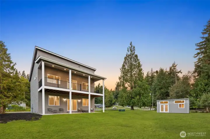 Situated on a rare double lot w/ 147 feet of private Lake Ketchum shoreline!