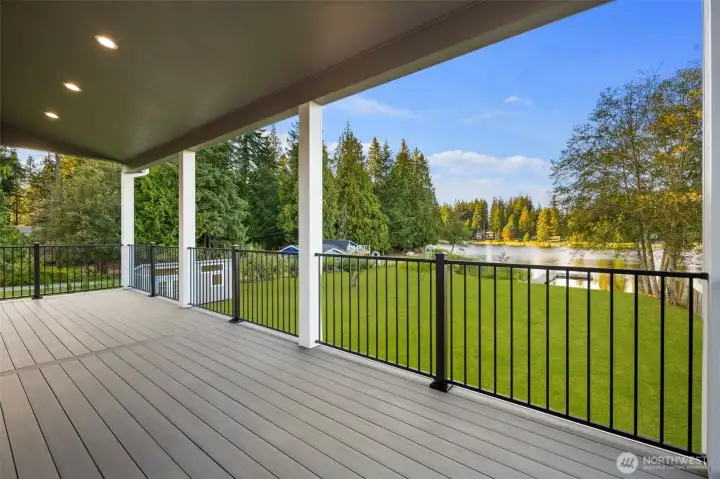 Indoor-outdoor living shines w/ a spacious covered deck.