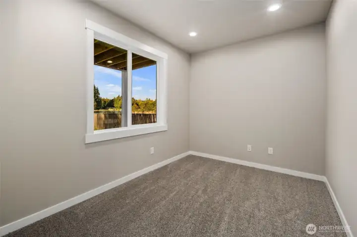 Downstairs guest bedroom #1 w/lake view.