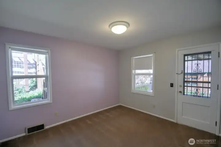 Back bedroom w/door to patio. French doors/slider would be a nice change.