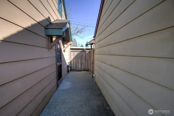 ADU entrance on left, secure/lockable door to alley access on rt