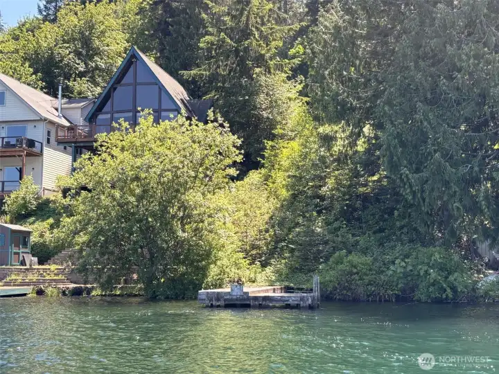 from the lake looking at the dock and propertyt