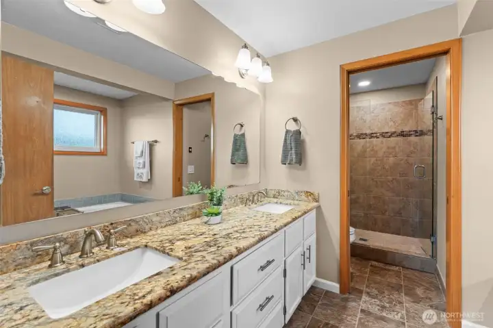 Primary bath with separate shower and commode area
