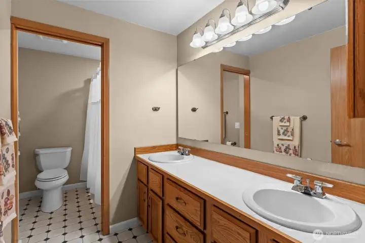 Large full bath upstairs with separate shower/commode area